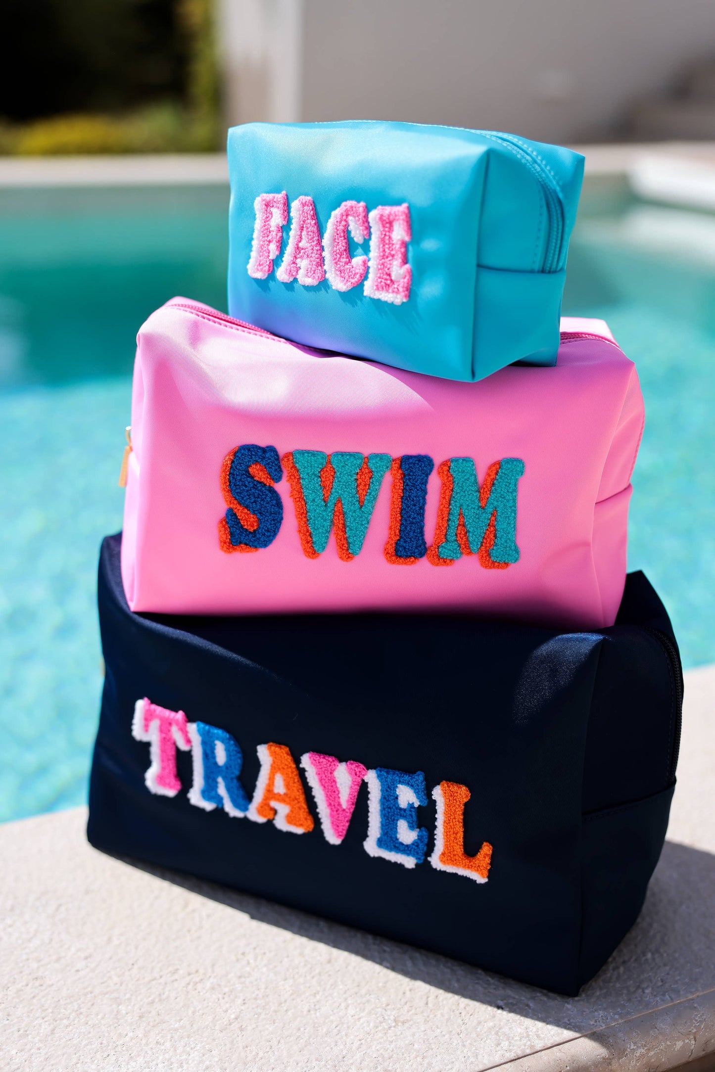 "FACE" SMALL ZIP POUCH